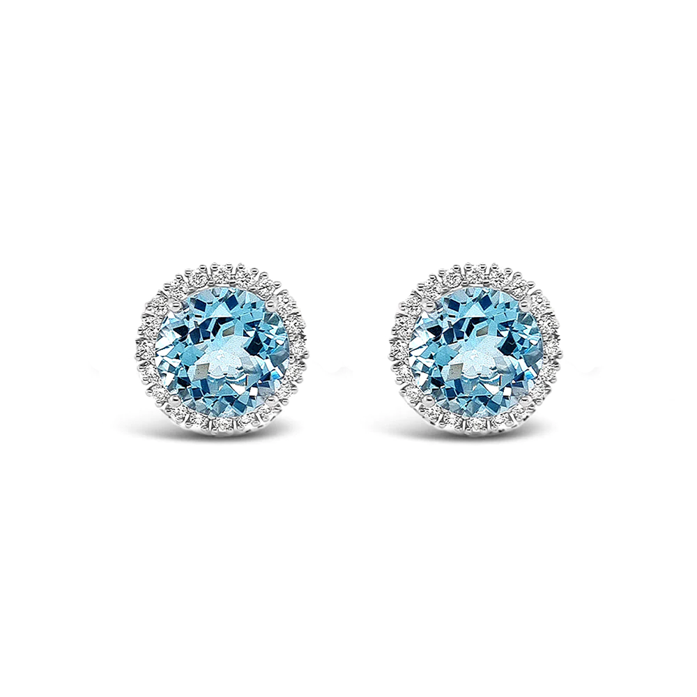 Aros de oro blanco con topacios