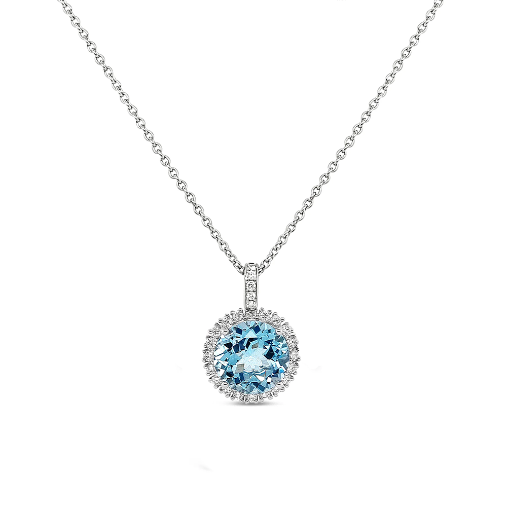 Collar oro blanco con 1 topacio azul.
