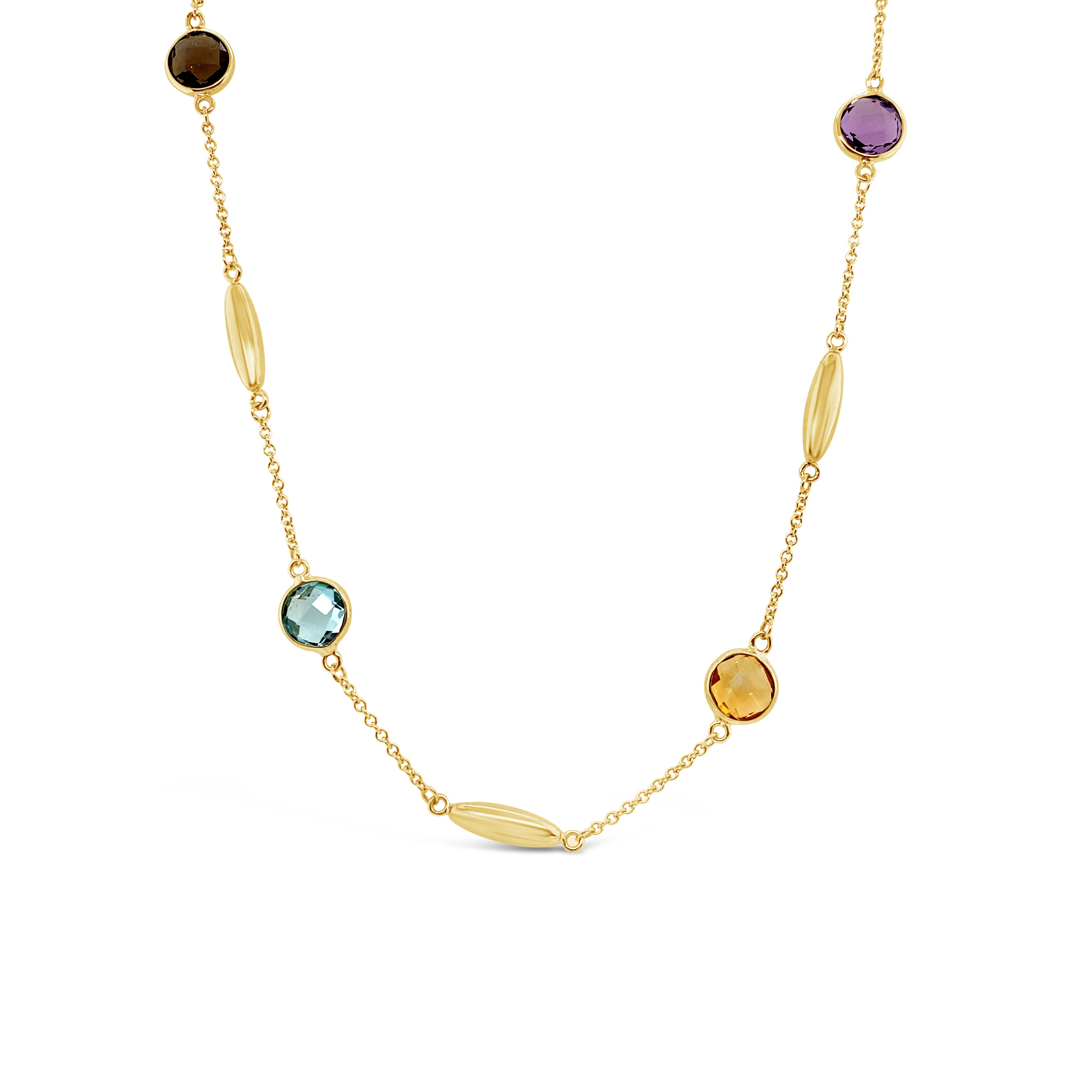 Collar de oro amarillo con piedras preciosas.