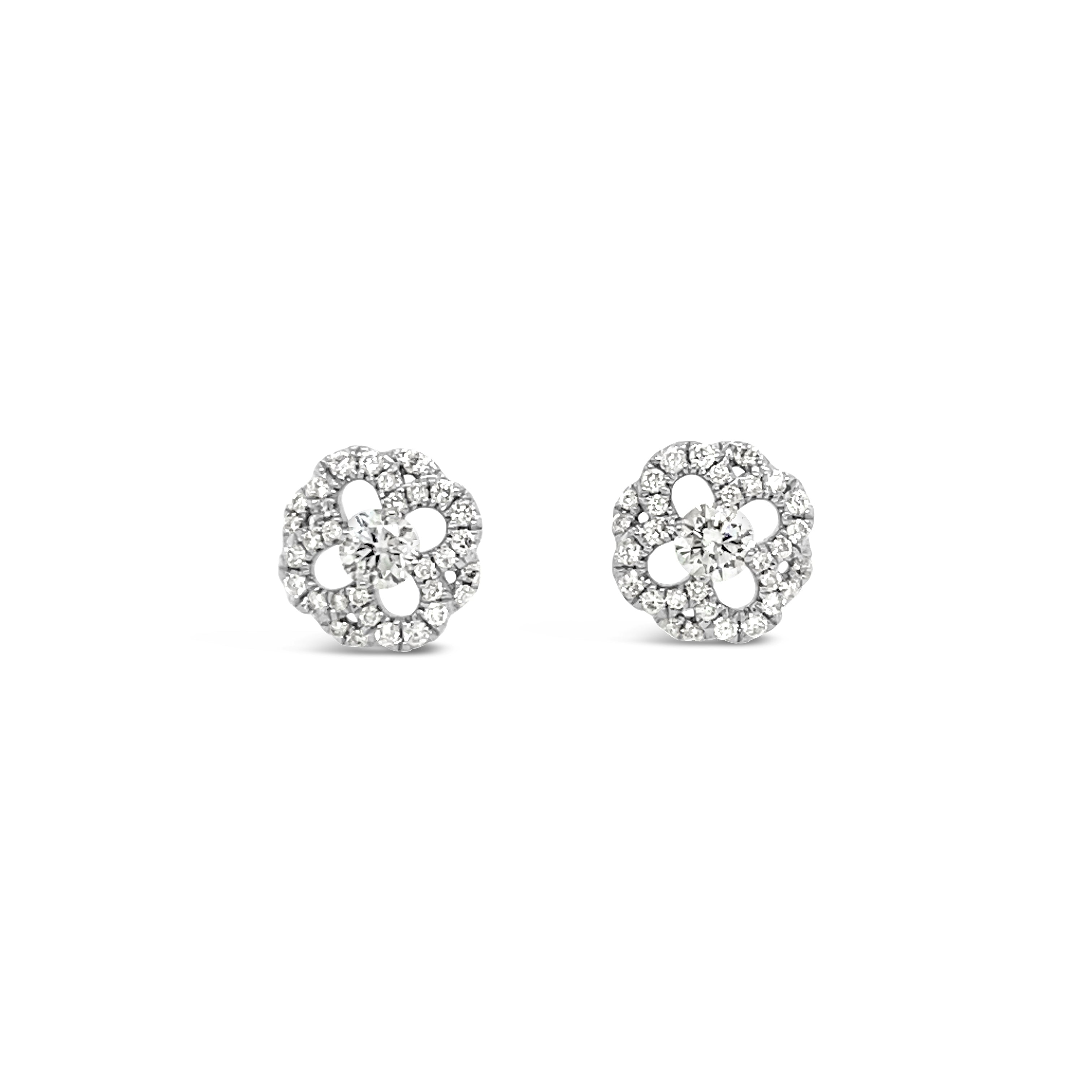 Aros de oro blanco flores.