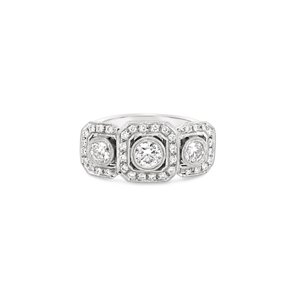 Anillo 3 diamantes en octagonos.