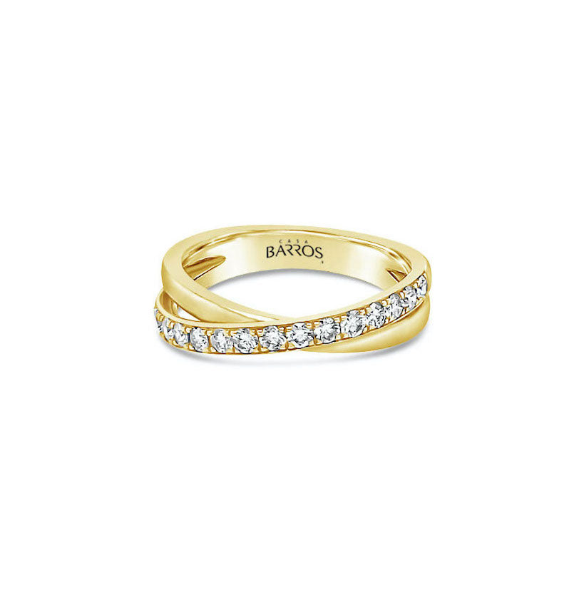Anillo oro amarillo cruzado y diamantes.