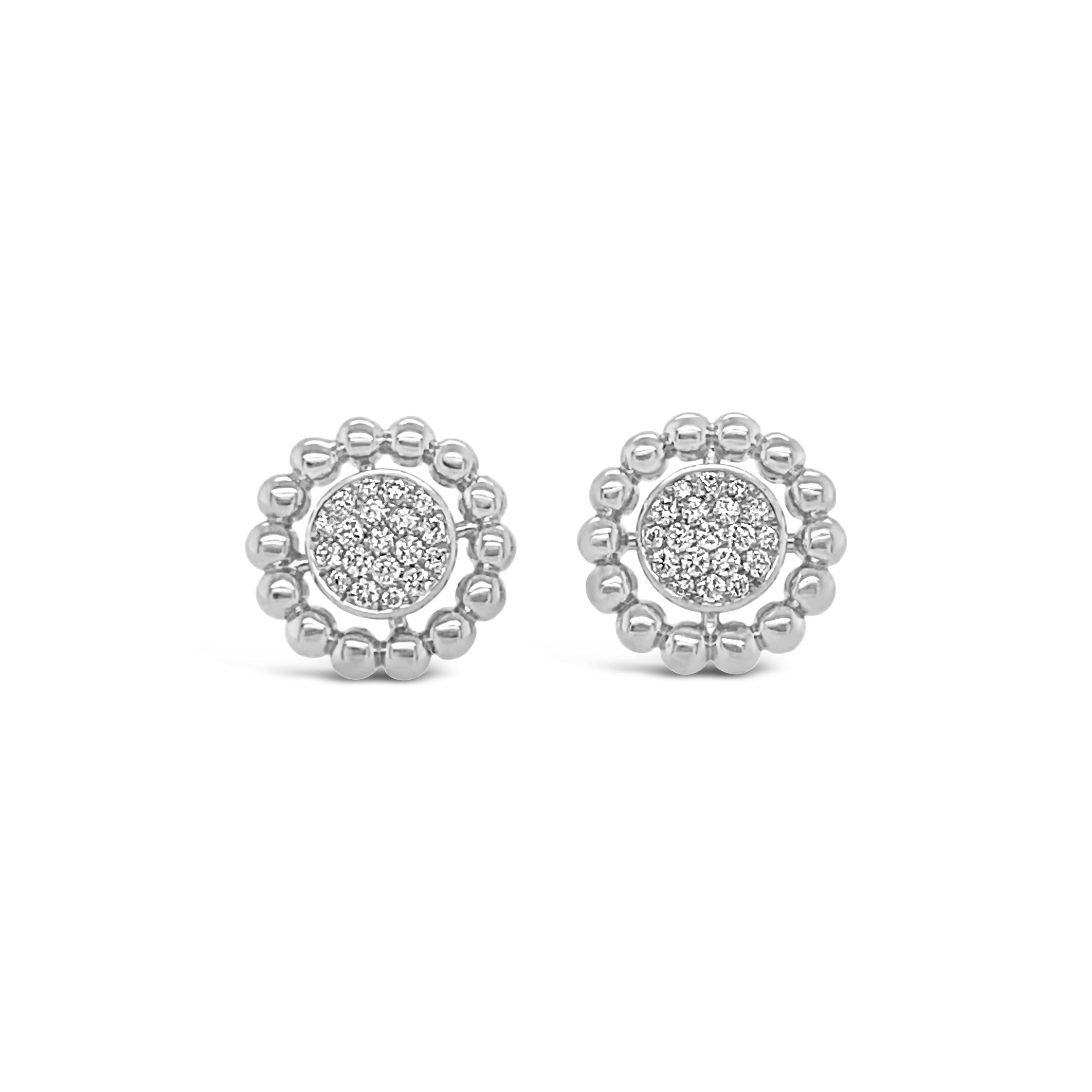 Aros sol de oro blanco.