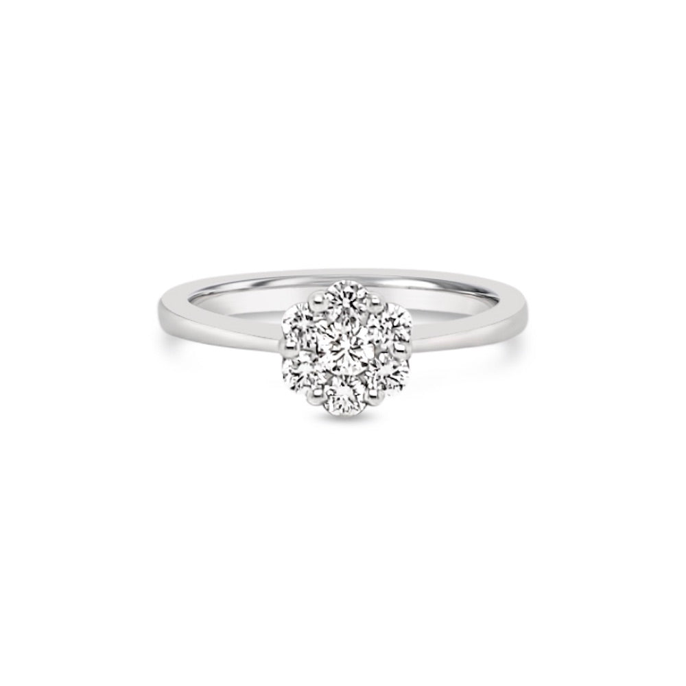 Anillo flor con 7 diamantes.