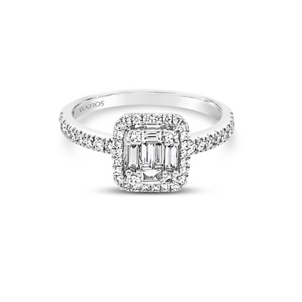 Anillo con diamantes baguette central.