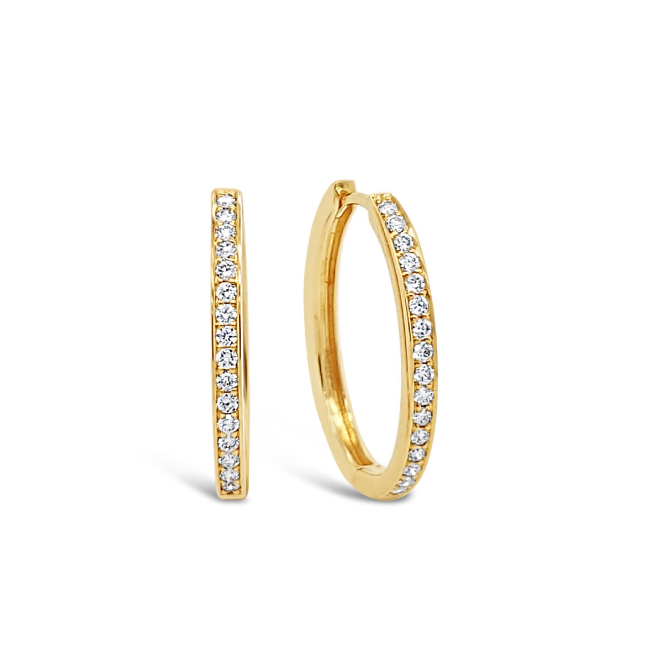 Aros argolla oval de oro amarillo y diamantes